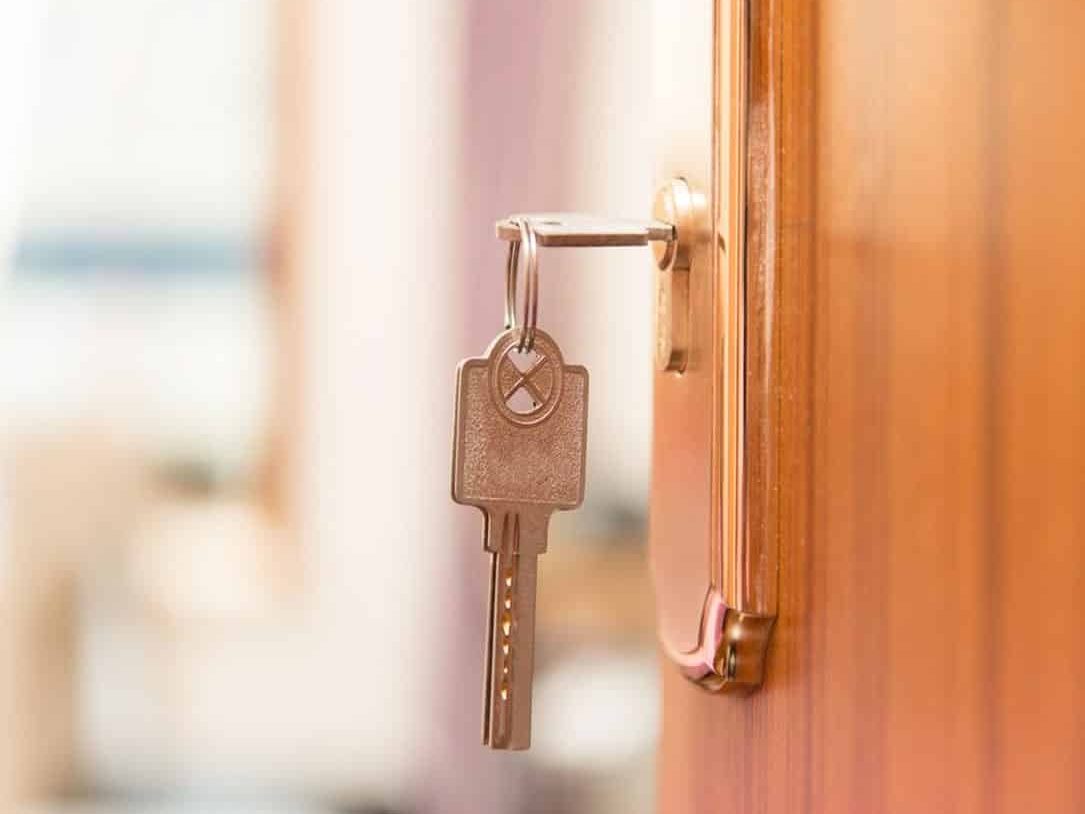 Key On Keyhole In Door — Chalet Motor Inn